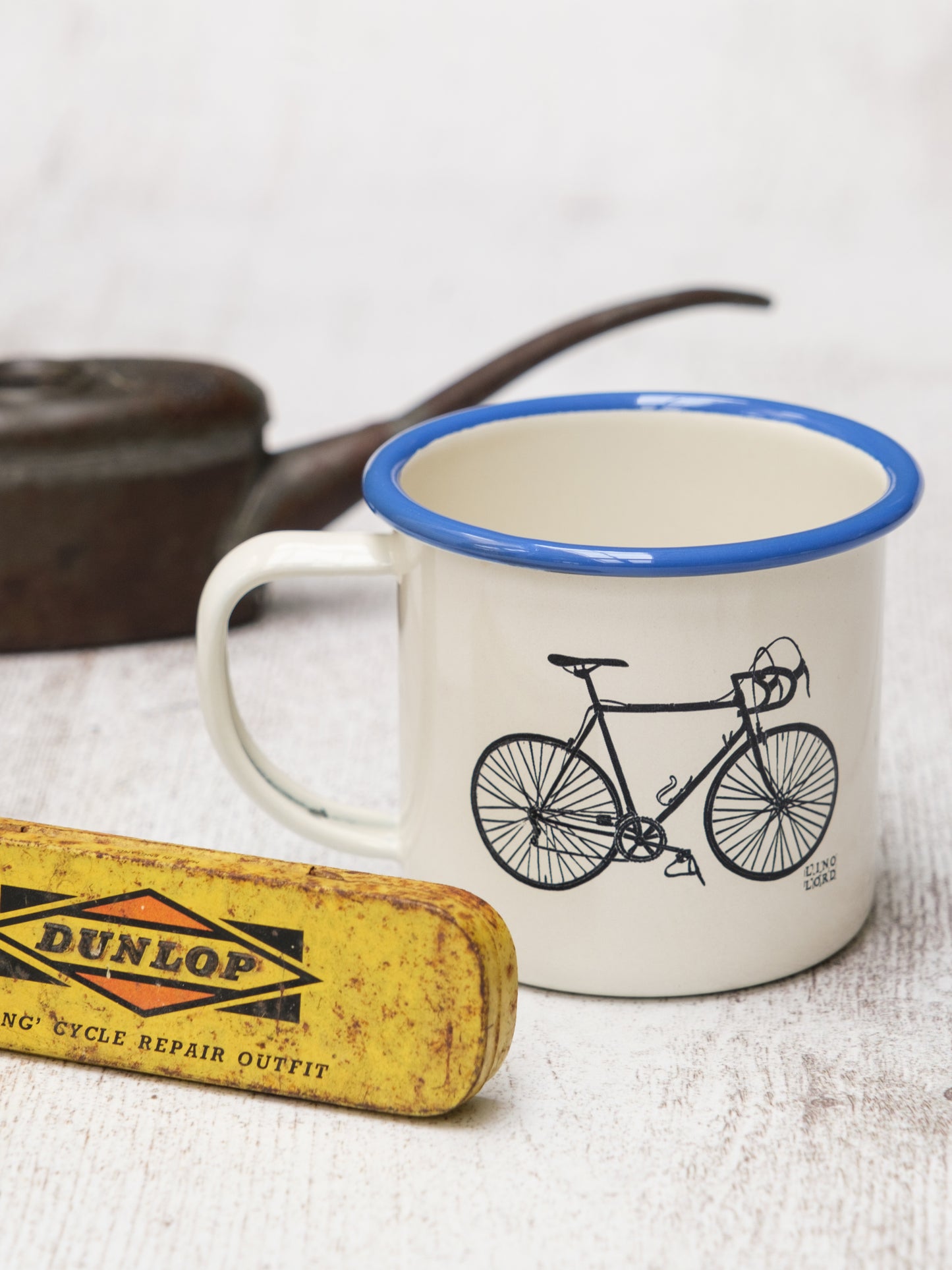 Cream Enamel Mug with Vintage Racing Bicycle Design