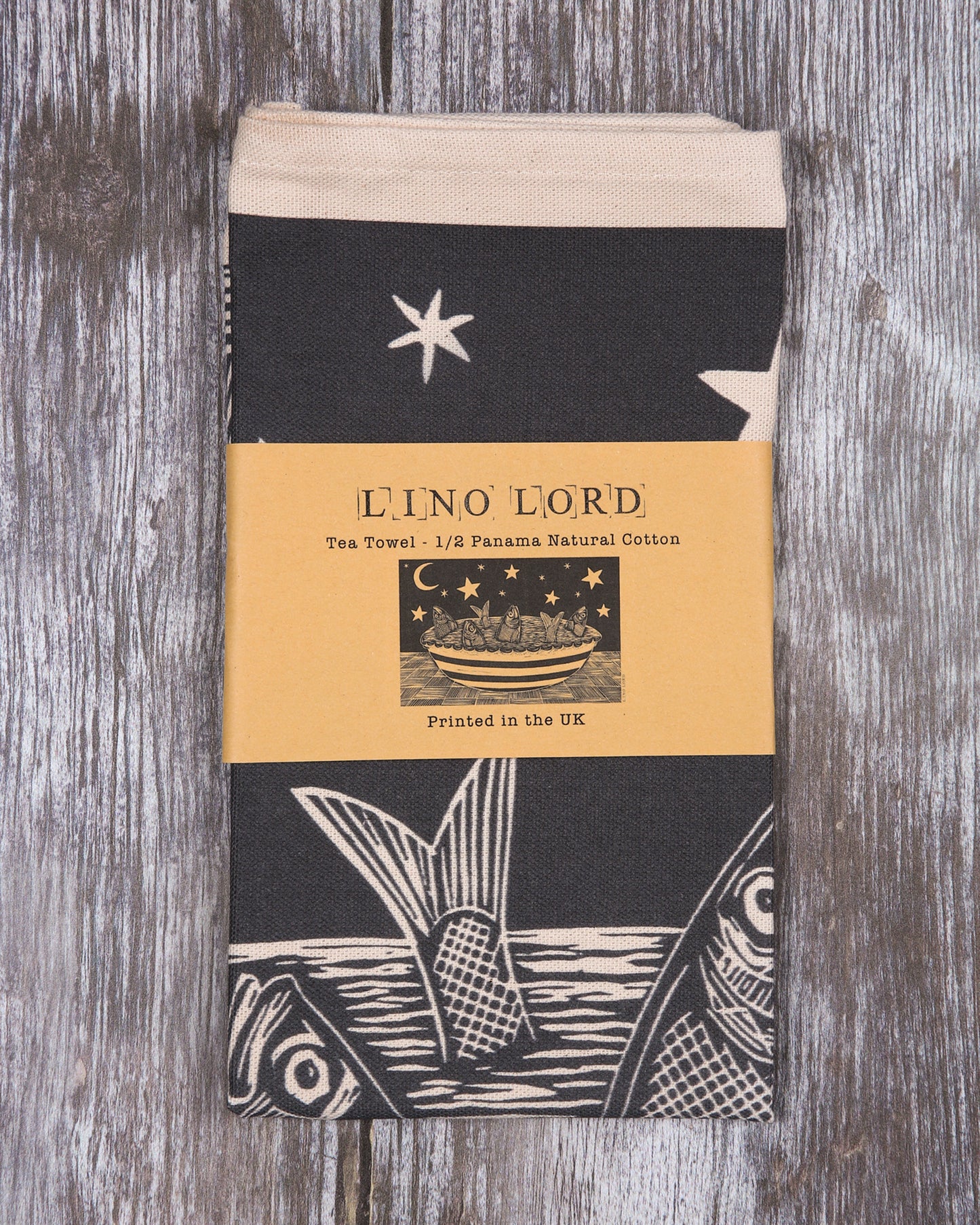 Cotton Tea Towel of Stargazy Pie Lino Print